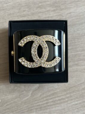 CHANEL Black Resin Cuff with Crystal-Embellished Gold CC